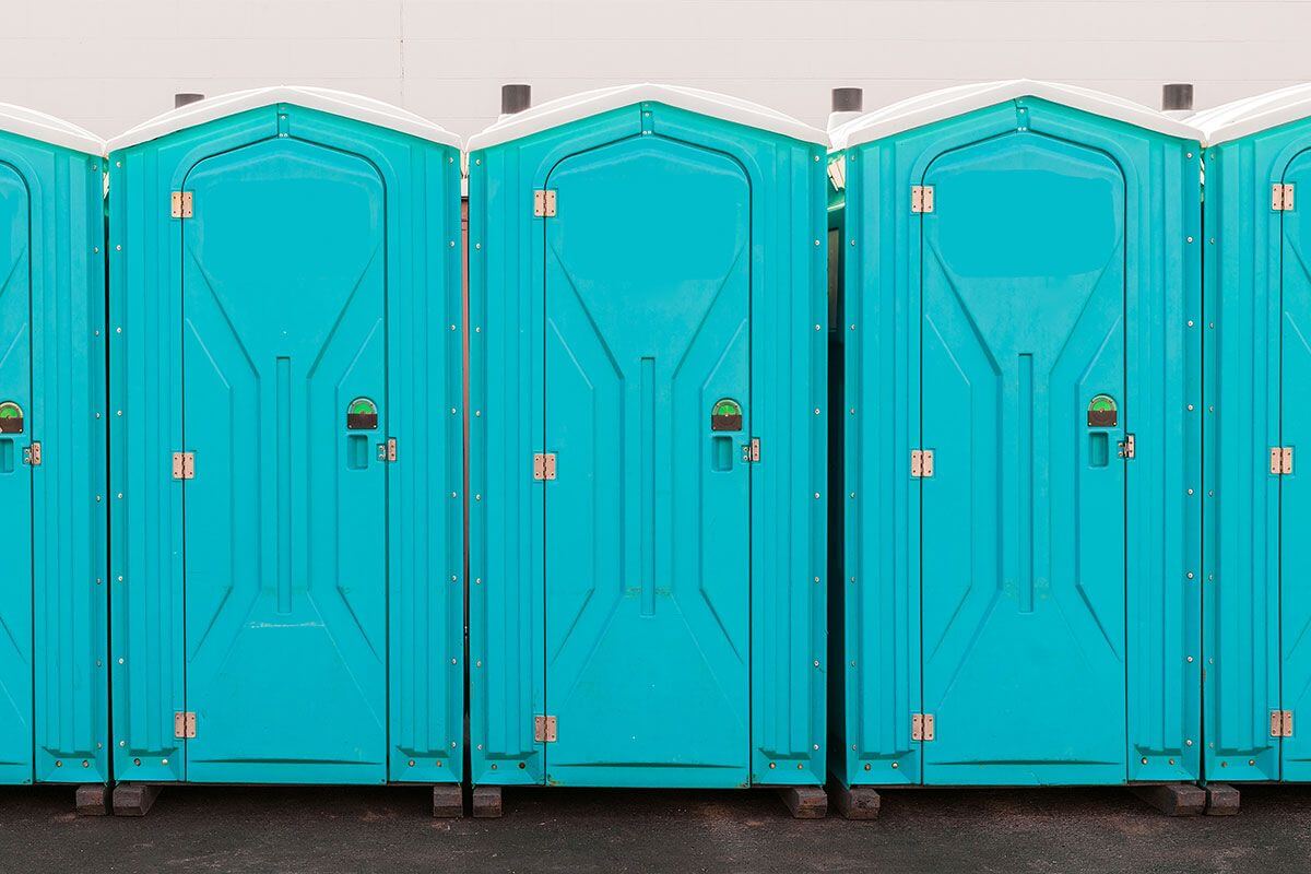 Industrial portable restroom units at a plant in Holmesburg, Pennsylvania